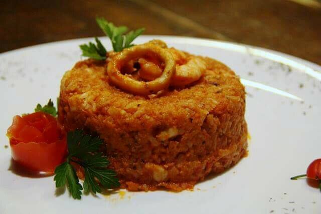 Arroz com frutos do mar, tradição da casa